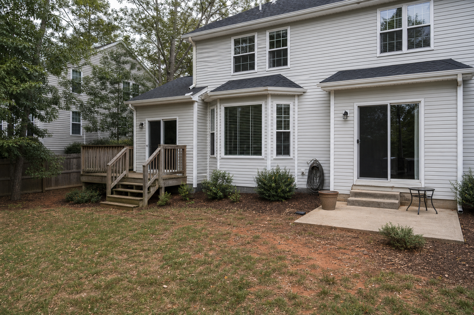 Backyard before a large connected deck project